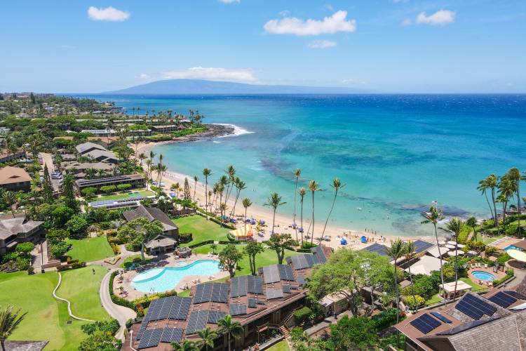 Aerial view of tropical destination with white sand and turquoise water on the Kapalua coast in Maui, Hawaii.