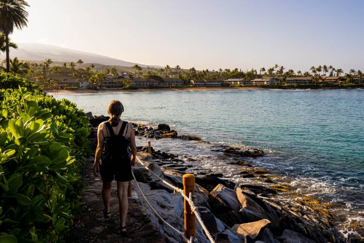 Female Hiker on Path Overlooking Napili Bay on The Kapalua Coastal Trail, Maui, Hawaii