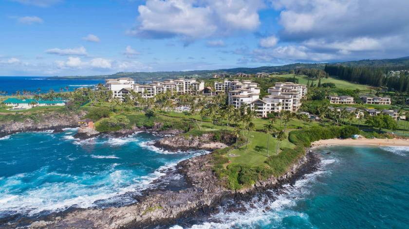 View of Kapalua Resort next to the ocean, a golf course lines the shore