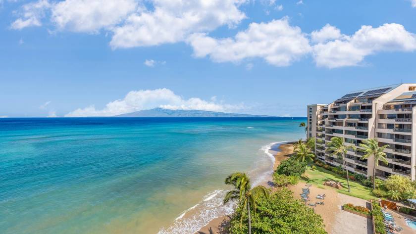 View from private lanai at Sands of Kahana resort, featuring beautiful beach and island in the distance
