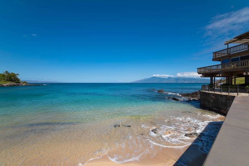 View of the ocean from a condo rental in Kahana Sunset resort, which sits right on the seawall within walking distance to a beautiful beach