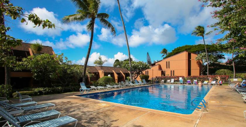 Kuleana Resort large heated pool with lounge chairs